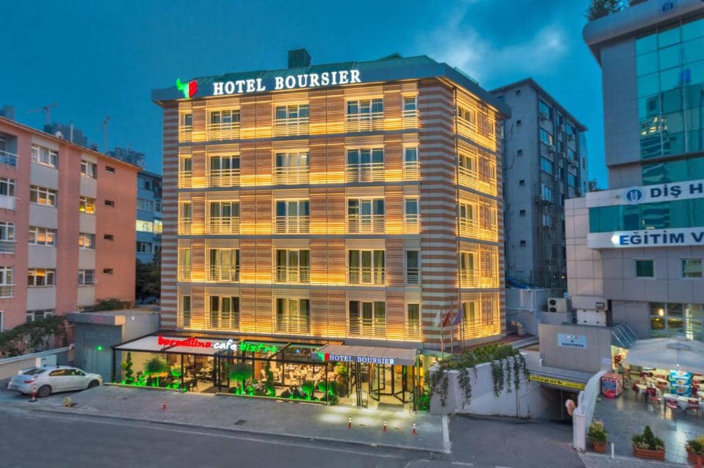 Hotel Boursier 1 & Spa - a hotel building with a sign on top of it at Hotel Boursier 1 &amp; Spa in Istanbul