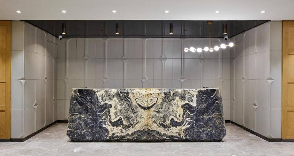 Lamartine Hotel - a lobby with a marble table in the middle at Lamartine Hotel in Istanbul