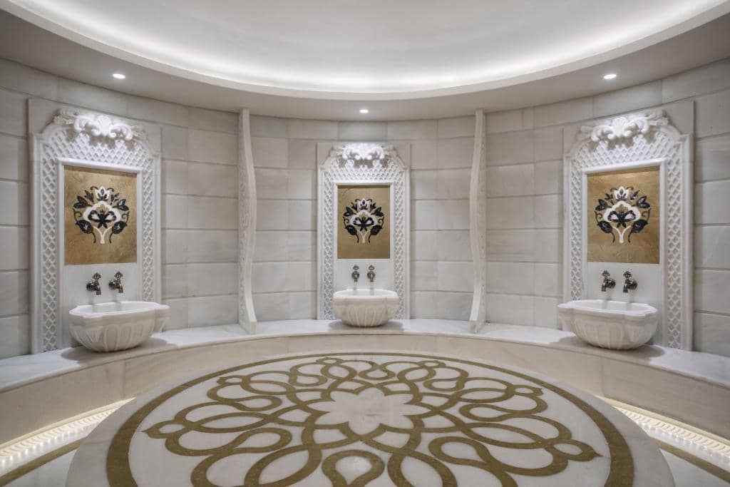 Lazzoni Hotel - a bathroom with two sinks in a room at Lazzoni Hotel in Istanbul