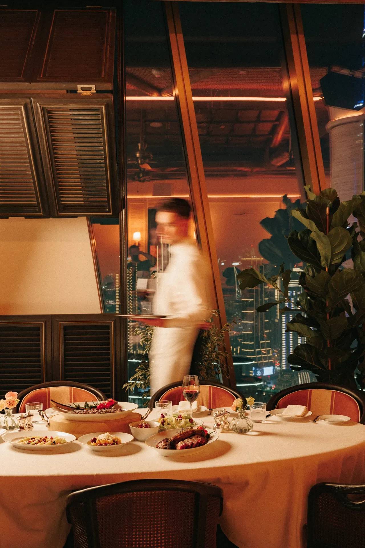 Elegant dining setup at Lion in the Sun Dubai venue.