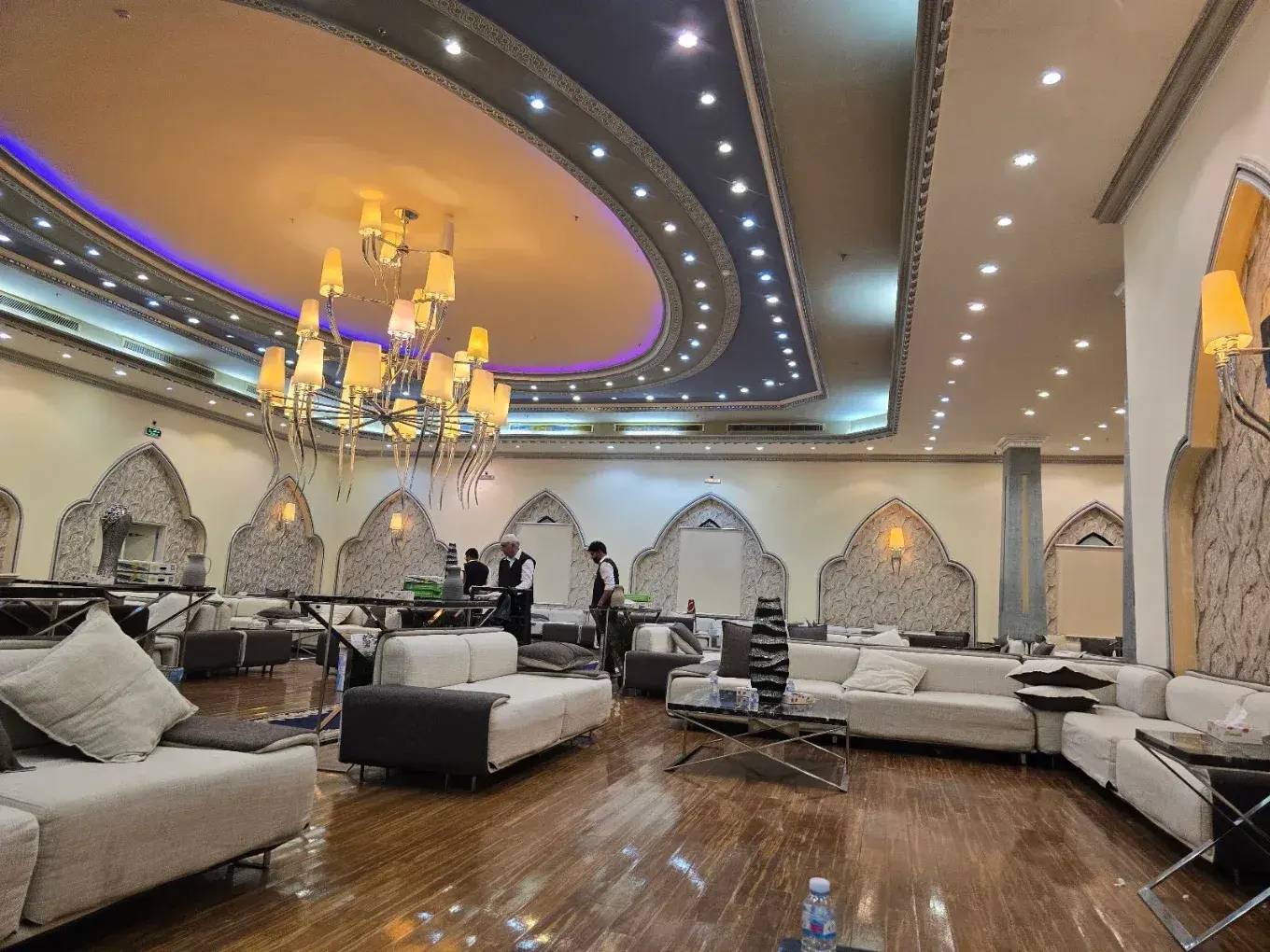 Elegant interior with chandeliers at One Thousand and One Nights Wedding Hall Madinah.