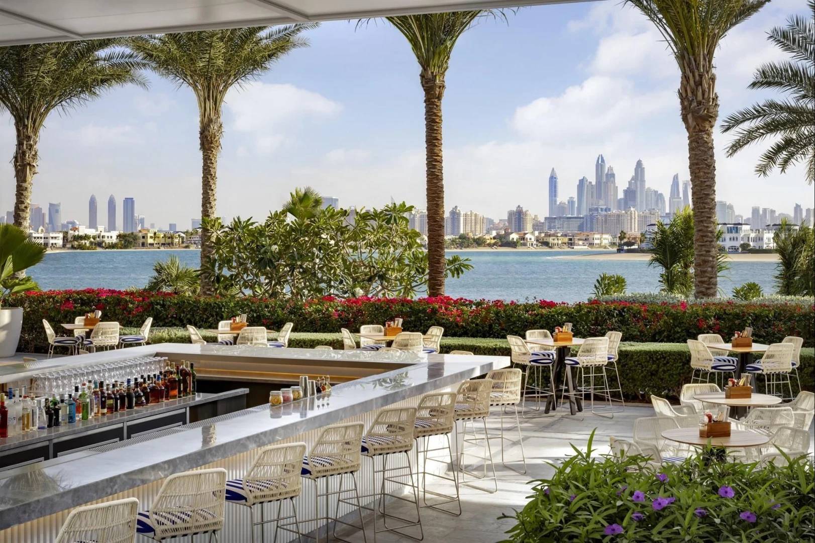 Outdoor bar with Dubai skyline at Atlantis The Royal, Dubai.