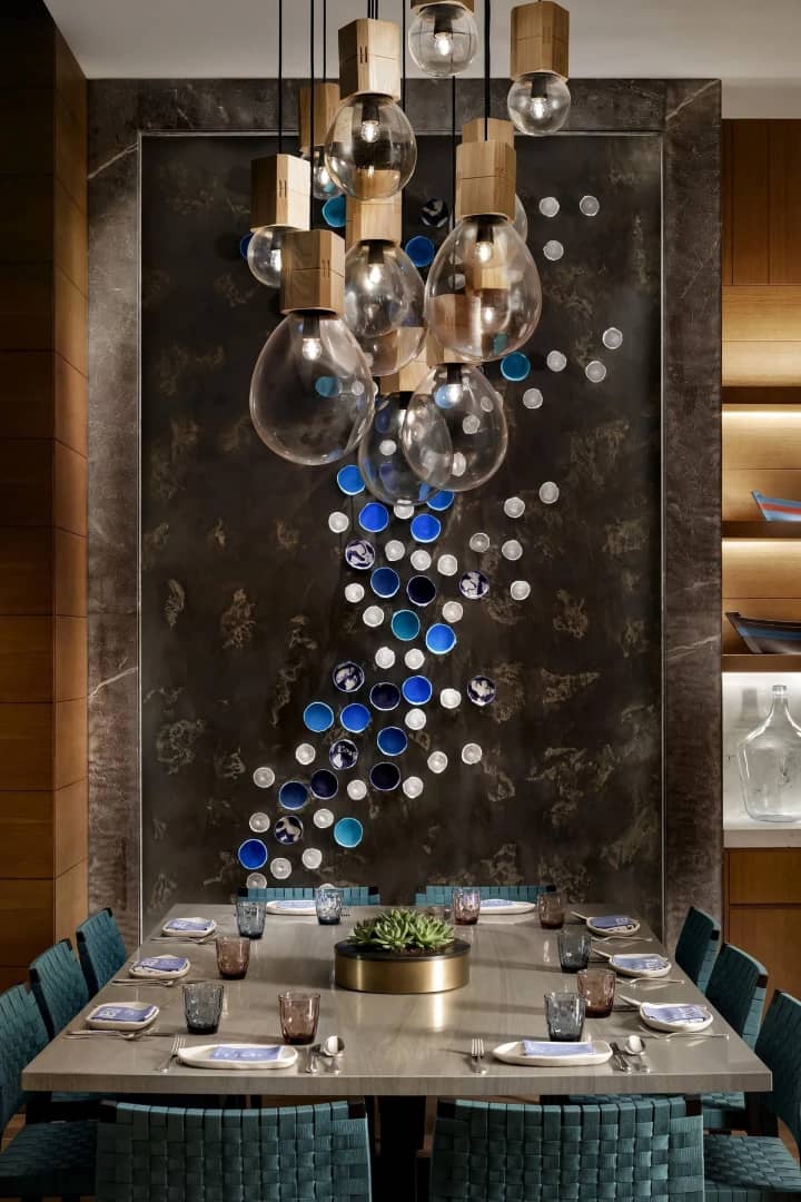Elegant dining area at Atlantis The Royal, Dubai with artistic decor.