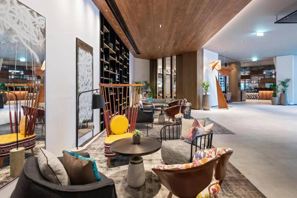 Modern lobby at Zabeel House The Greens, Dubai with stylish seating.