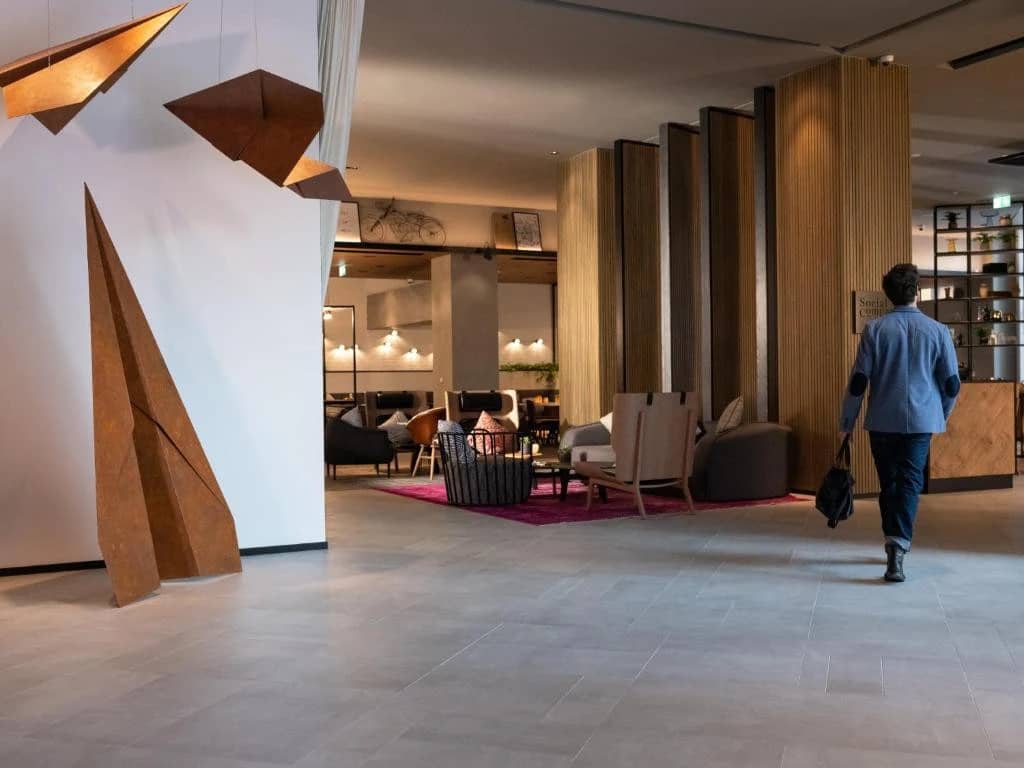 Modern lobby at Zabeel House The Greens, Dubai, with geometric decor.