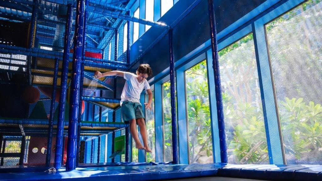 Child playing in indoor playground, Jumeirah Beach Hotel, Dubai.