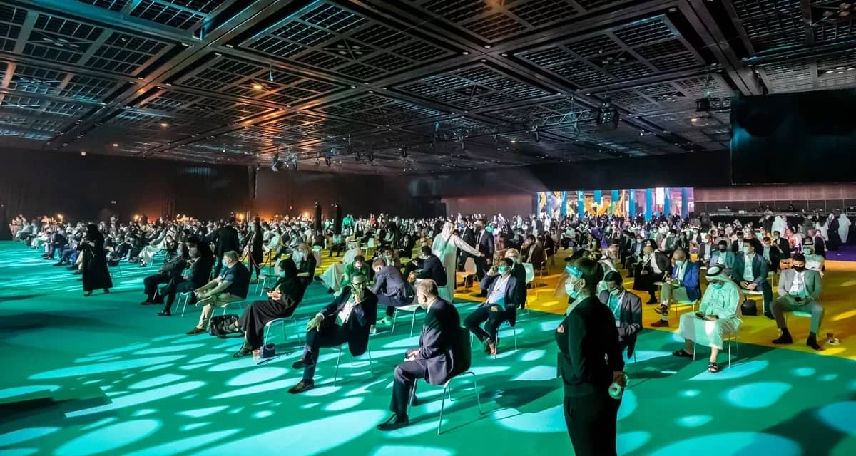Conference attendees seated at Dubai World Trade Centre, Dubai.