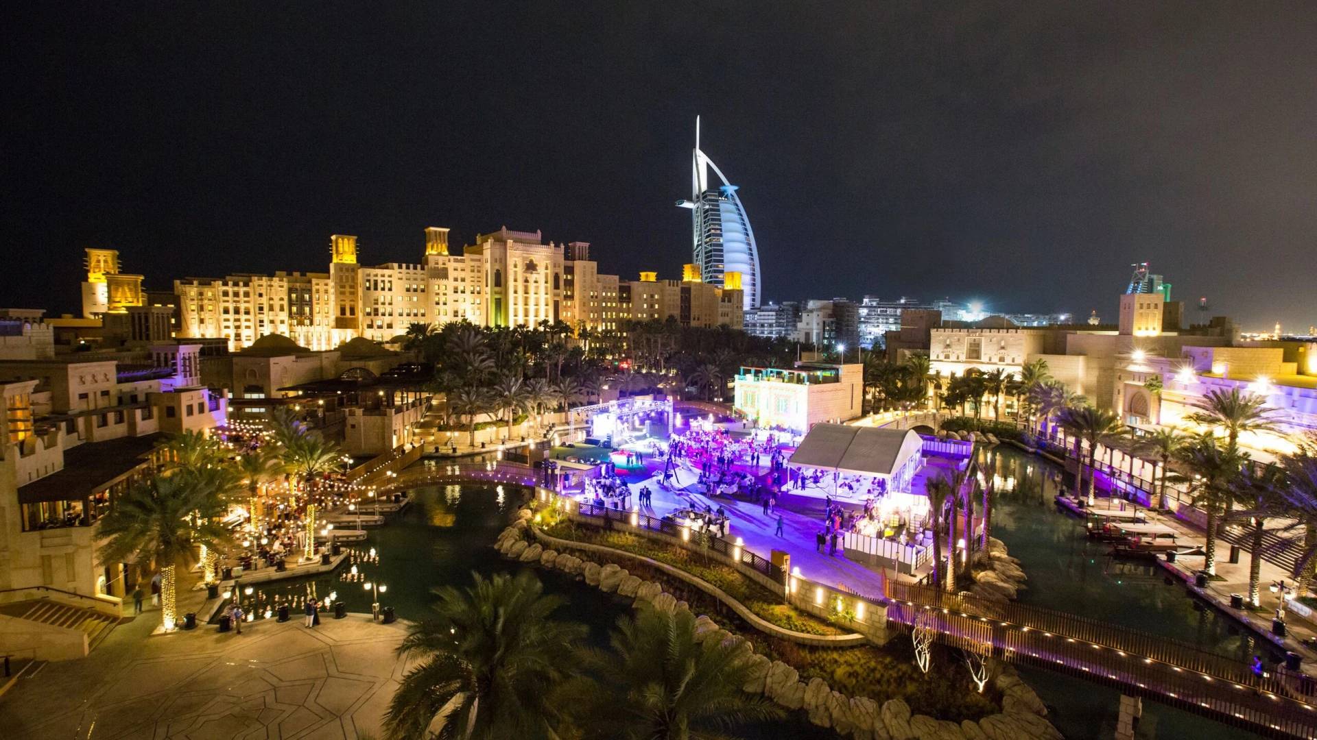 Madinat Jumeirah Fort Island at night, overlooking Burj Al Arab, Dubai.