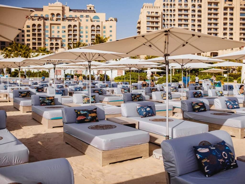 Outdoor lounge area with sunbeds at Gallery 7/40 Dubai.