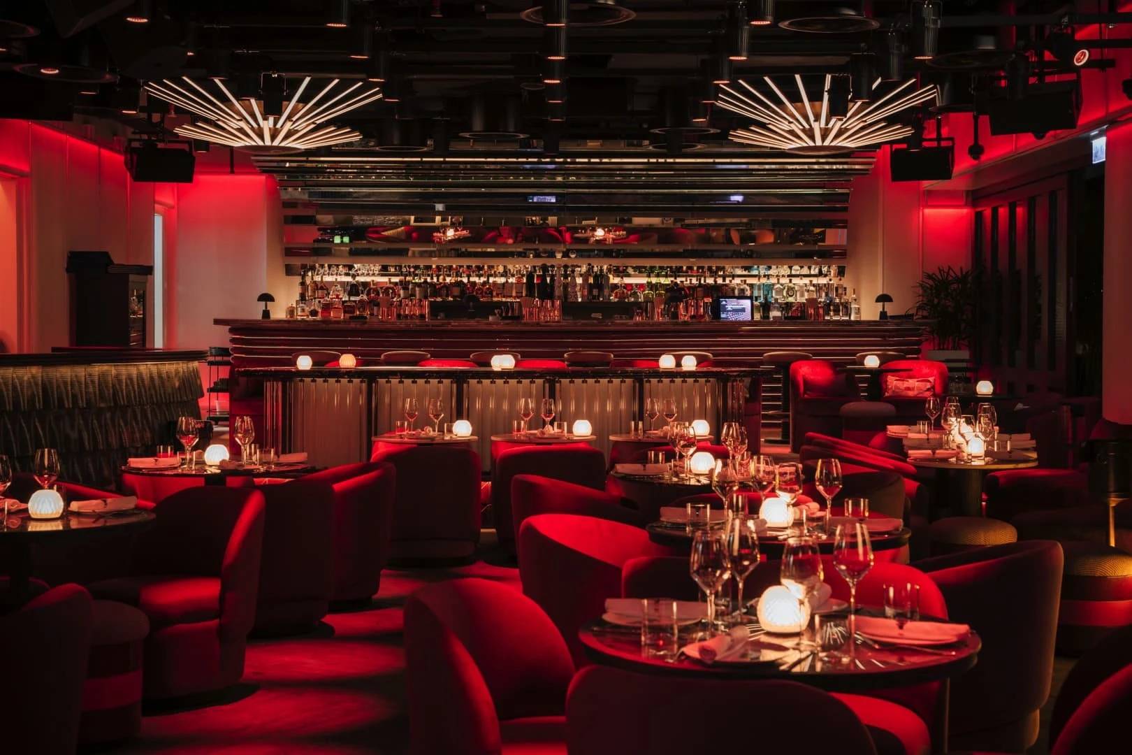 Luxurious dining area at Babylon Difc, Dubai with ambient lighting.