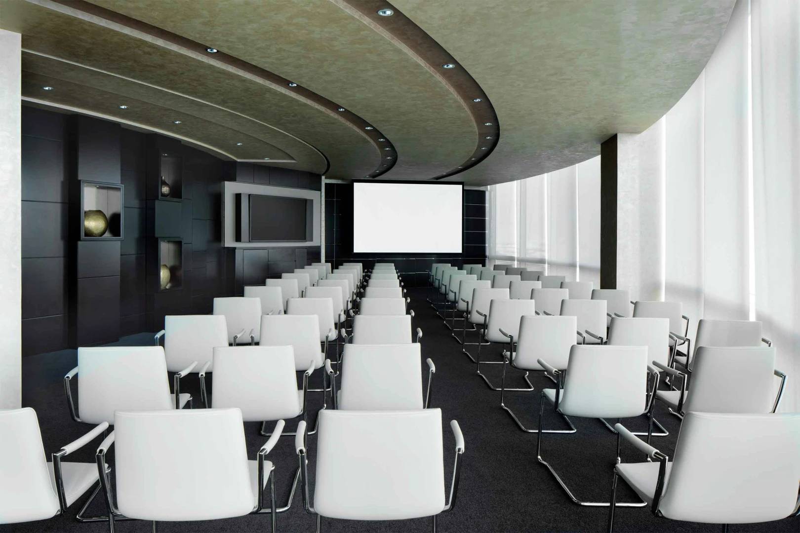 Conference room with white chairs, Jumeirah Emirates Towers, Dubai.