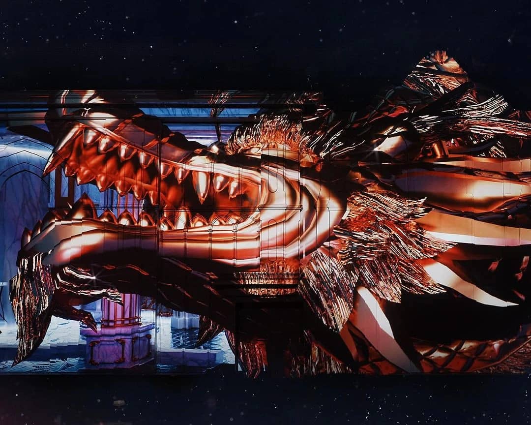 Dramatic dragon projection at DREAM Dubai Dinner Show venue.