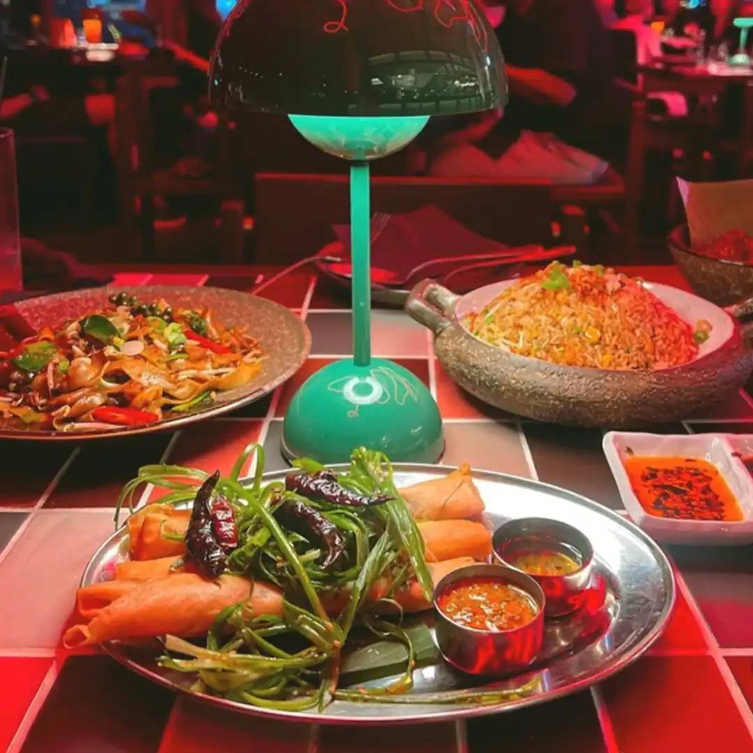 Colorful dishes at Hawkerboi, The Park JLT, Dubai restaurant.