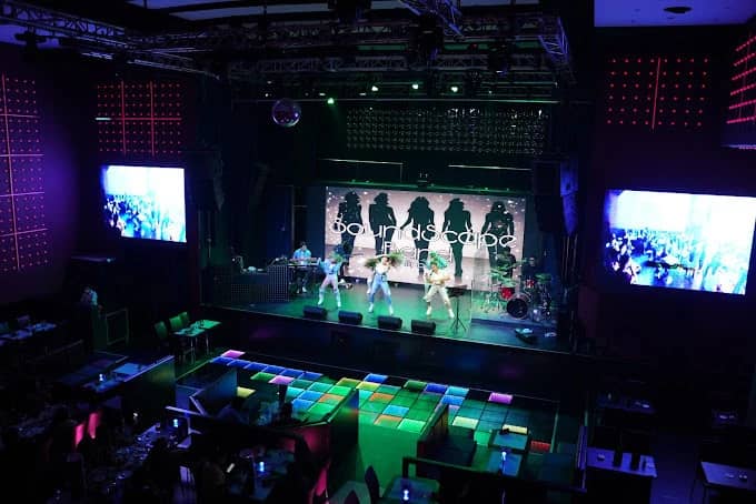 Boracay Night Club stage with performers and colorful lights in Dubai.
