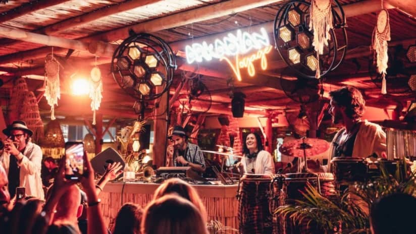 Live band performing at Surf Club Dubai with vibrant lighting.