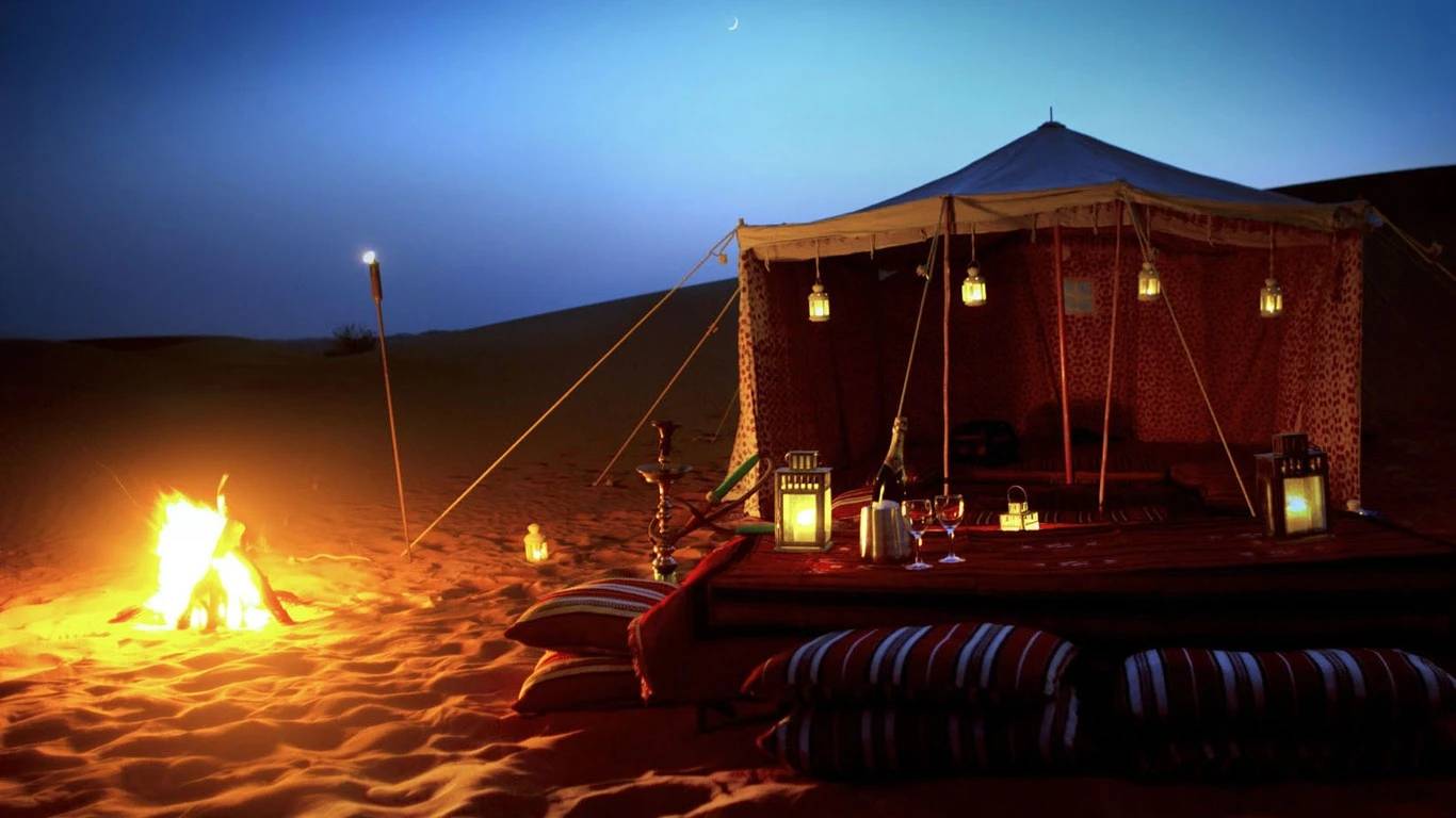 Nighttime desert campfire at Al Khatim Desert Safari, Abu Dhabi.