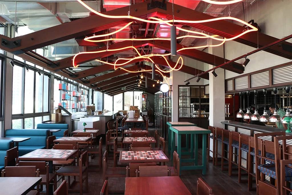 Interior of Hawkerboi, The Park JLT, Dubai with modern decor.