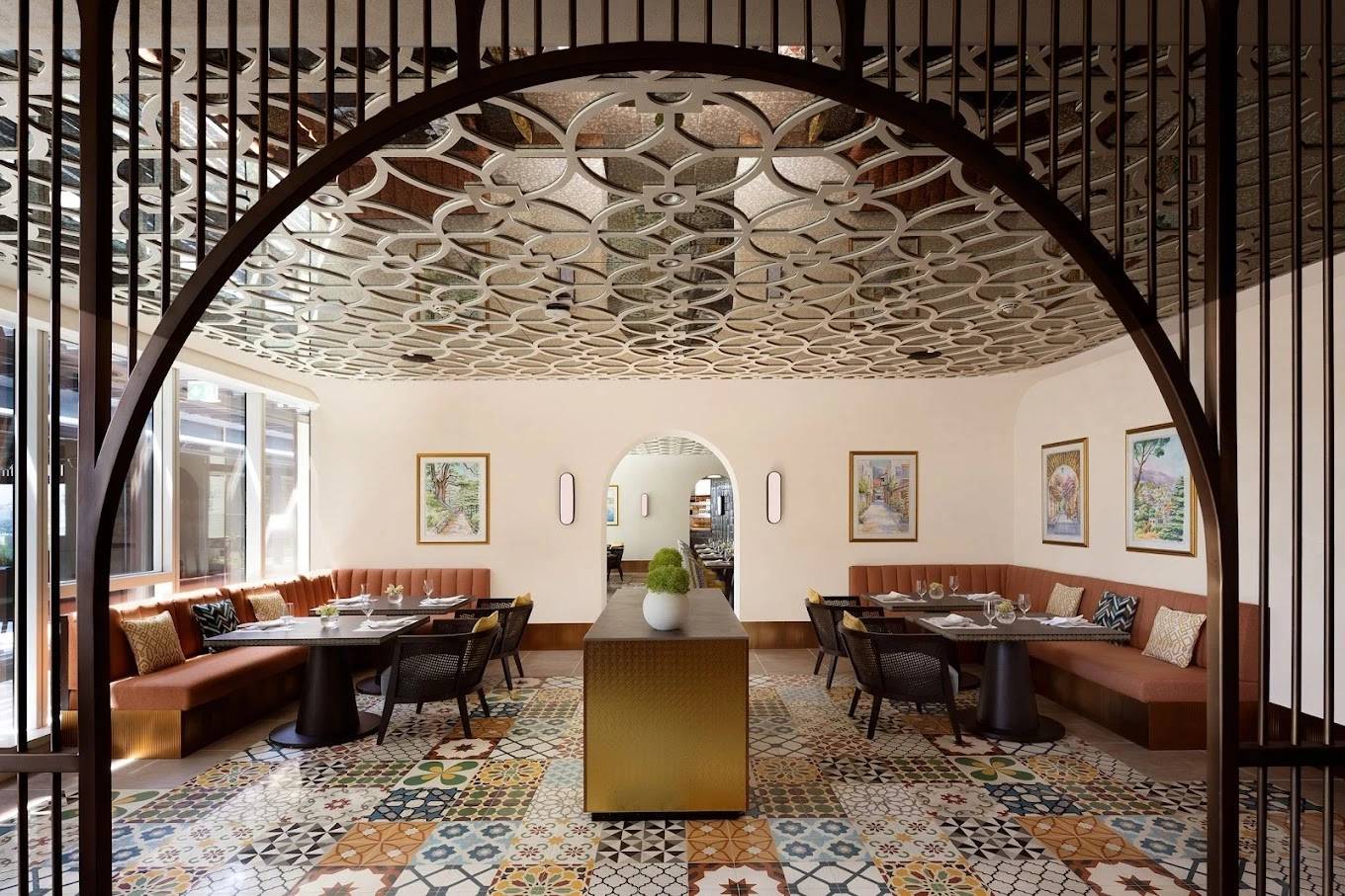 Elegant dining area at La Sirene Restaurant, Dubai with patterned floor tiles.