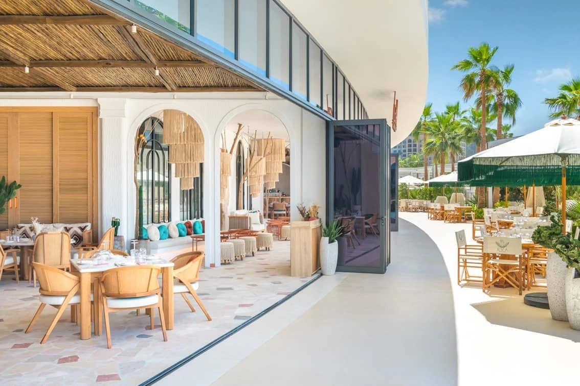 EVA Beach Restaurant interior and patio seating, Dubai.