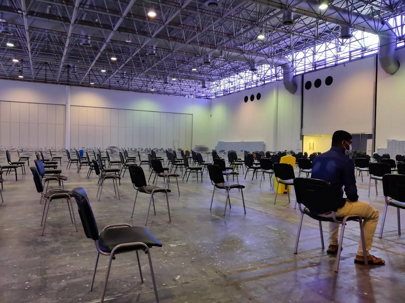 Spacious hall with distanced chairs, Expo Centre Sharjah, Sharjah.