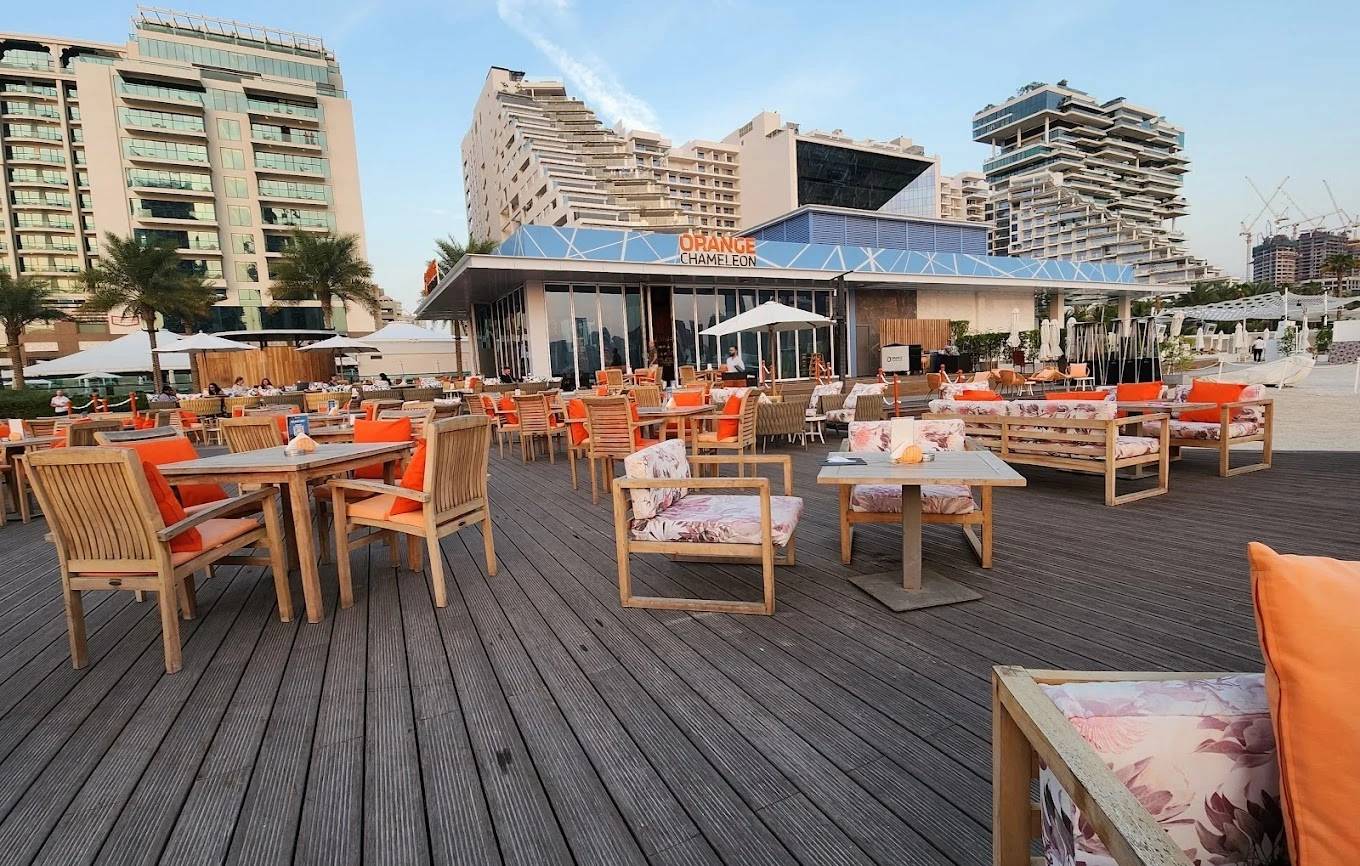 Outdoor seating at Orange Chameleon Restaurant & Lounge, Dubai.