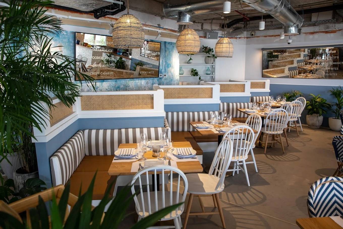 Cozy dining area at The Byron Bathers Beach Club, Dubai.
