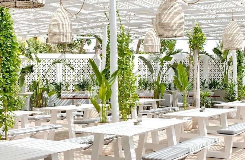 Outdoor seating at The Byron Bathers Beach Club, Dubai.