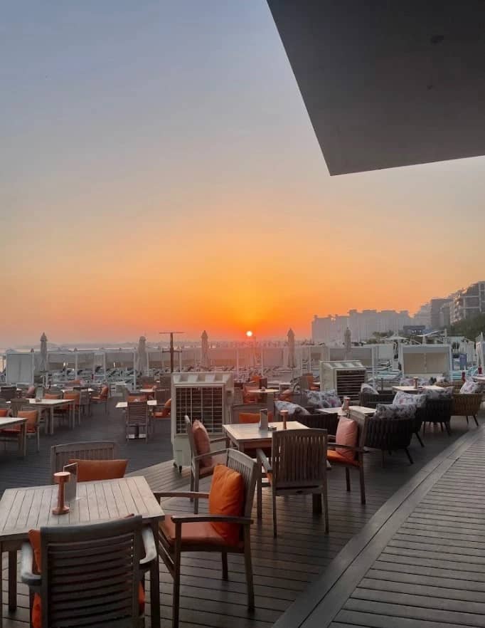 Sunset view from Orange Chameleon Restaurant & Lounge, Dubai terrace.