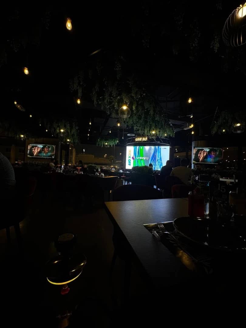 Dimly lit Charcoal Garden Restaurant & Cafe in Dubai Media City
