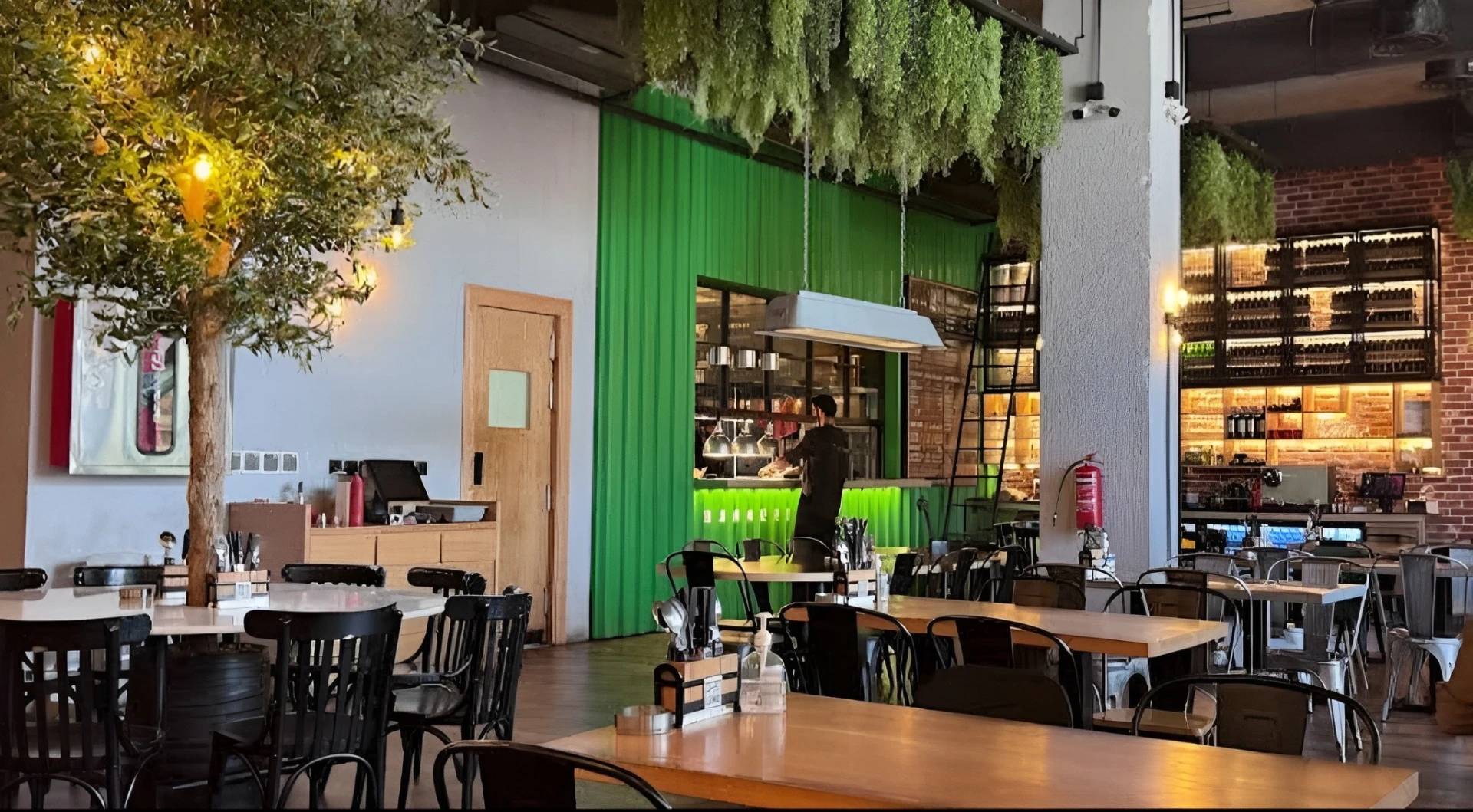 Swiss Butter Le Mall Jeddah, cozy dining area with greenery.