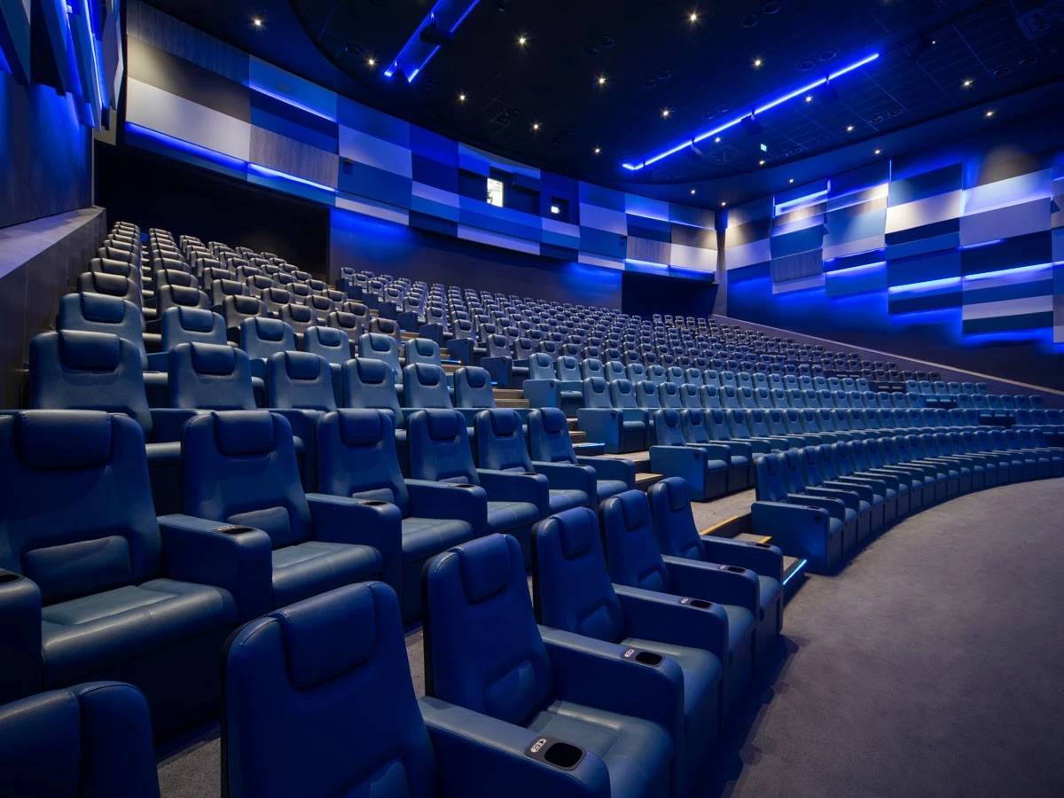 Novo Cinemas The Pearl Doha, spacious theater with blue seating.