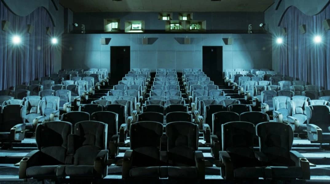 Empty theater seating at Reel Cinemas, Dubai Marina Mall.