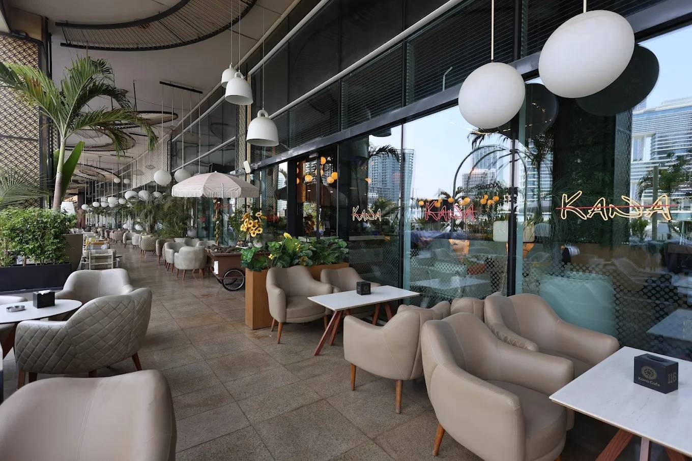 Outdoor seating at The Kana Cafe Downtown Dubai with modern decor.
