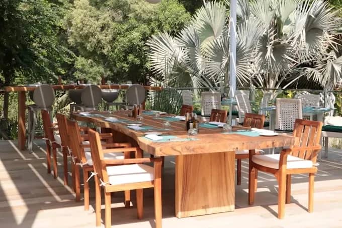 Outdoor dining area at The Farm Restaurant Al Barari, Dubai.