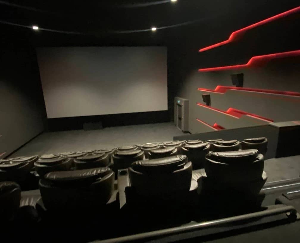 Empty theater with red accents, Empire Cinema Al Ahsa Al Hofuf.