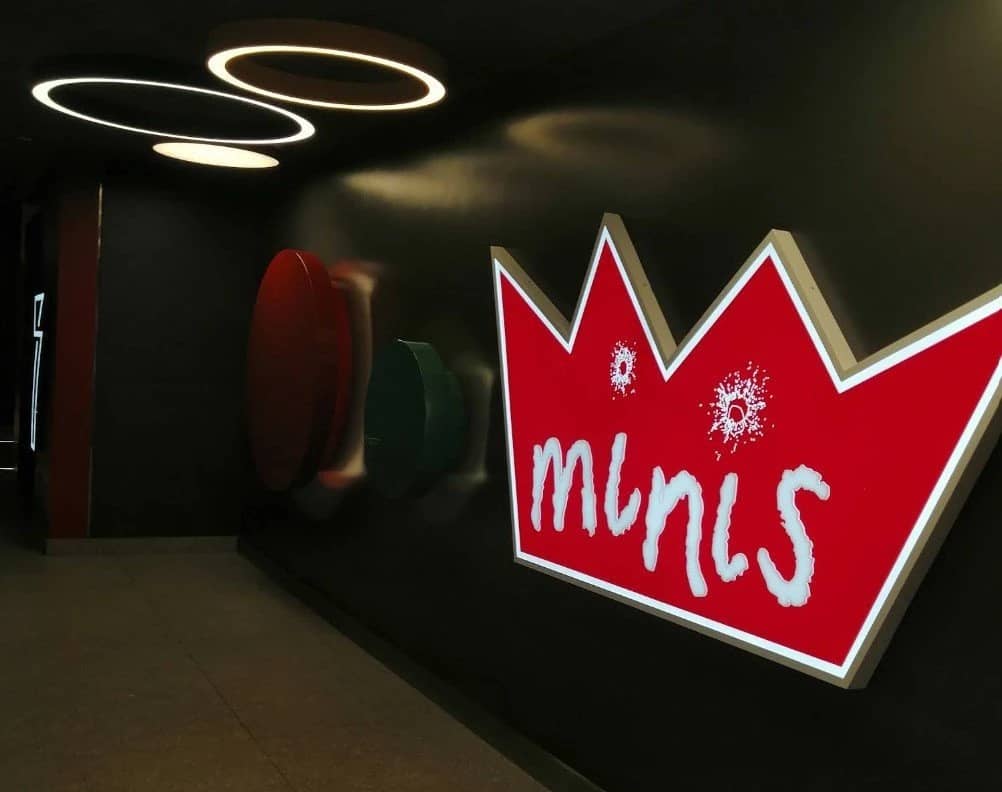 Empire Cinema Al Ahsa Al Hofuf hallway with illuminated signs.