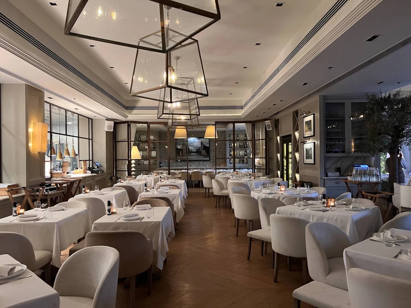 Elegant dining area at Il Borro Tuscan Bistro Dubai, set for events.