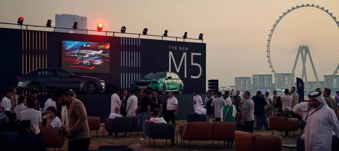 Outdoor event with cars and attendees at Skydive Dubai, Dubai, UAE