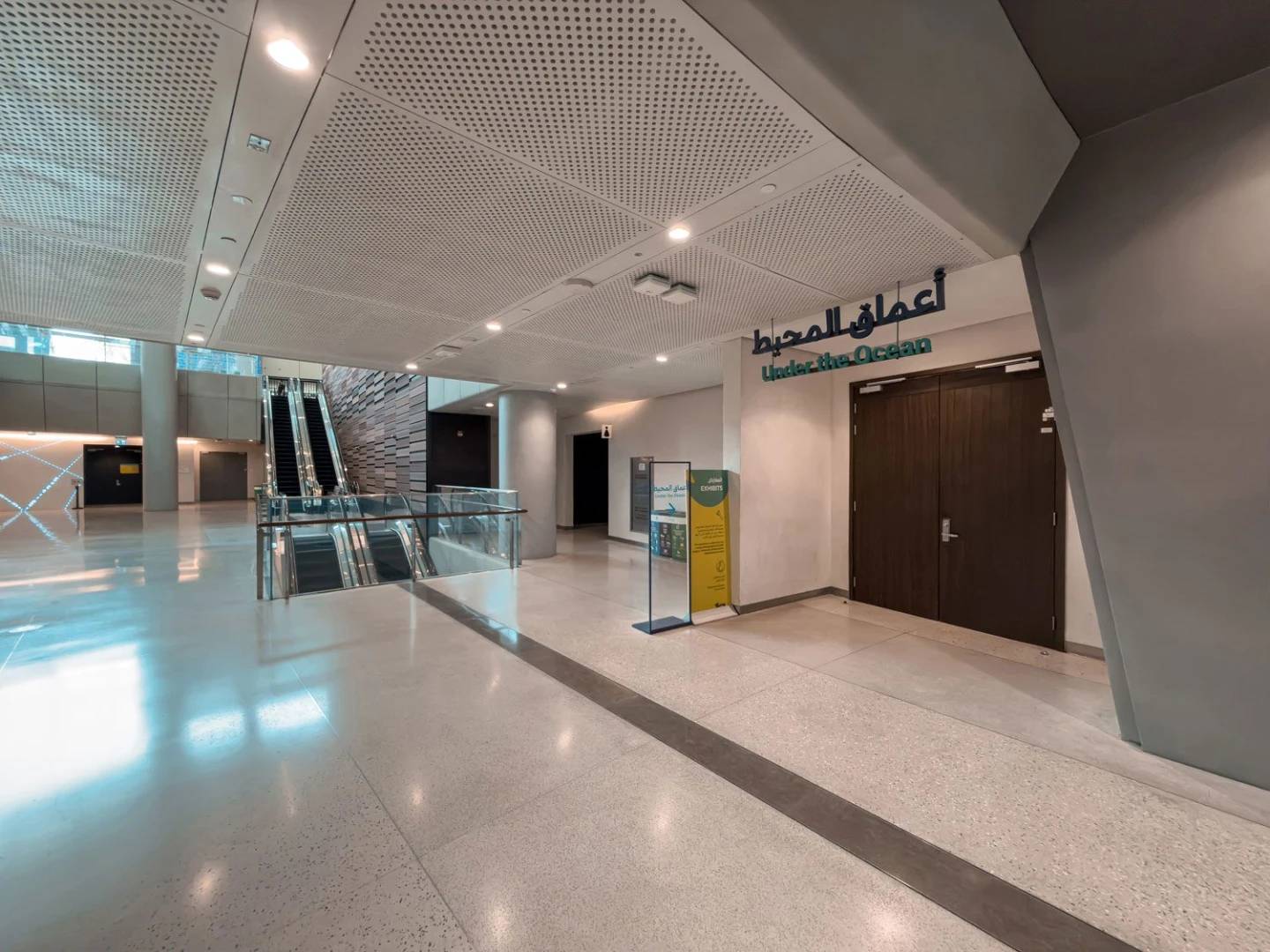 Spacious interior with escalators at Terra, Expo City Dubai, Dubai, UAE.
