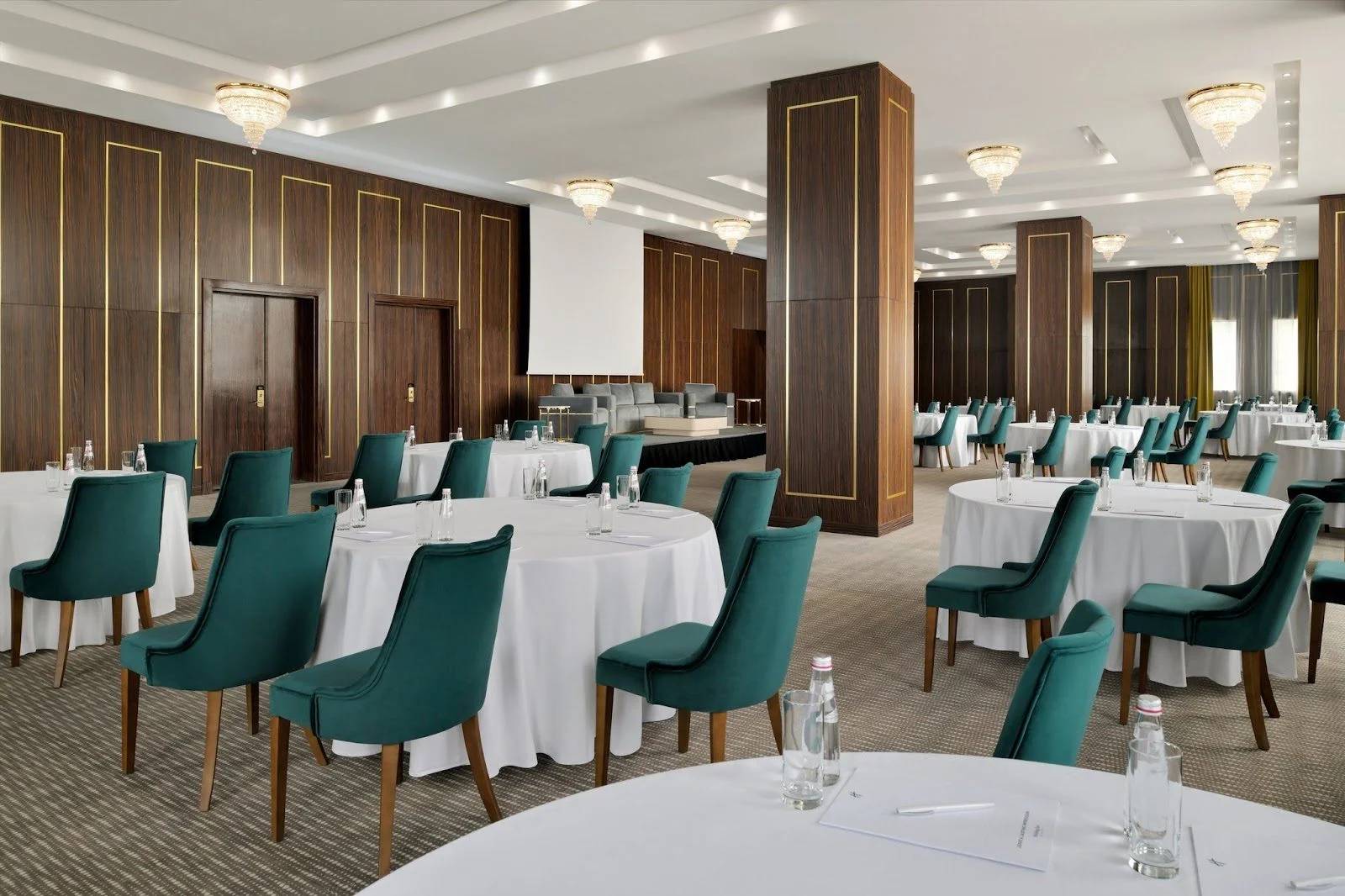 Elegant event space with round tables at Holiday Inn Riyadh al Malaz, Riyadh.