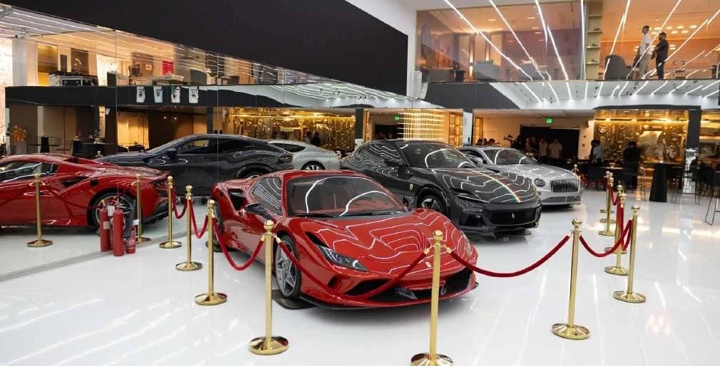 Luxury cars displayed at Aureum Club, Dubai, UAE.