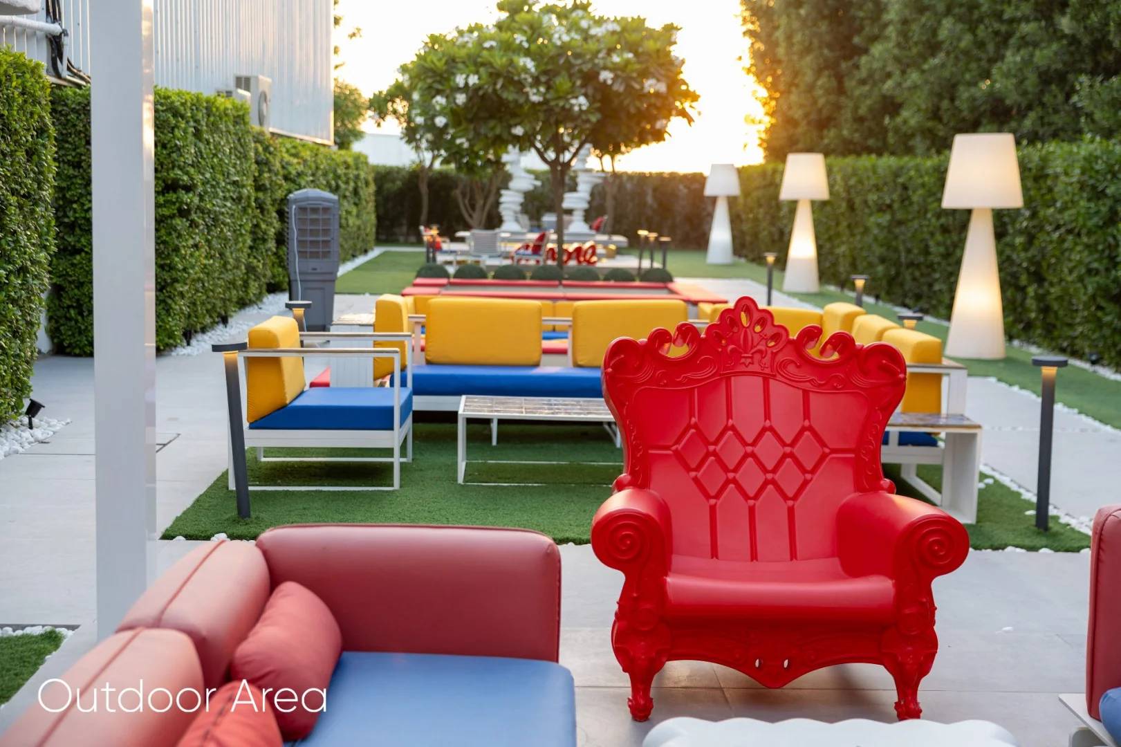 Colorful outdoor seating area at Aureum Club, Dubai, UAE