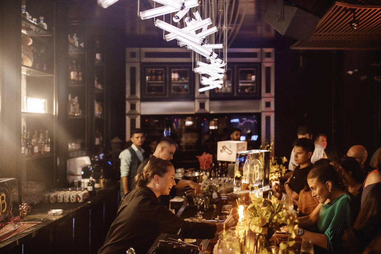 Bar area with patrons at Nazcaa Japanese Peruvian Dubai, Dubai, UAE
