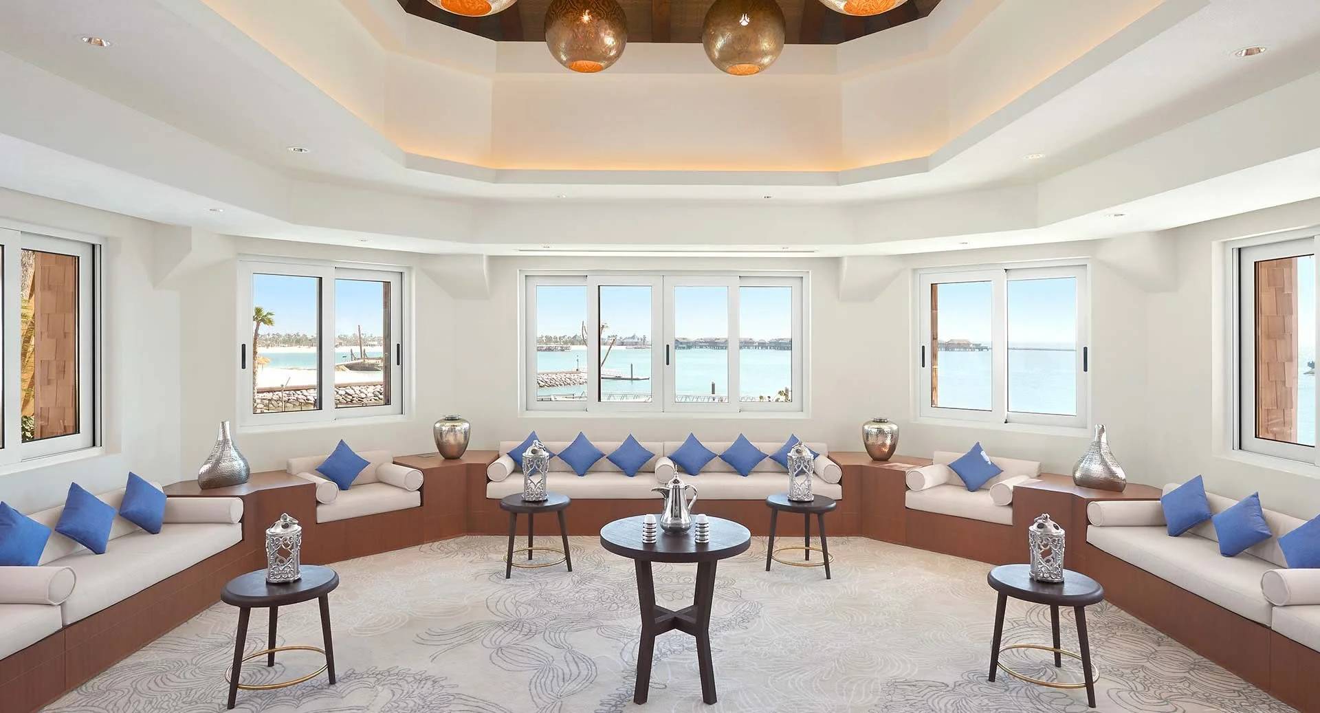 Elegant seating area with ocean view at Banana Island Resort Doha By Anantara.