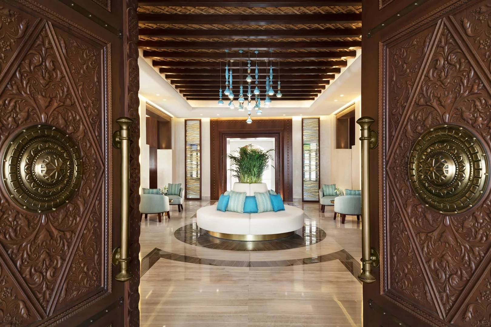 Elegant lobby with ornate doors at Souq Al Wakra Hotel, Doha, QATAR.