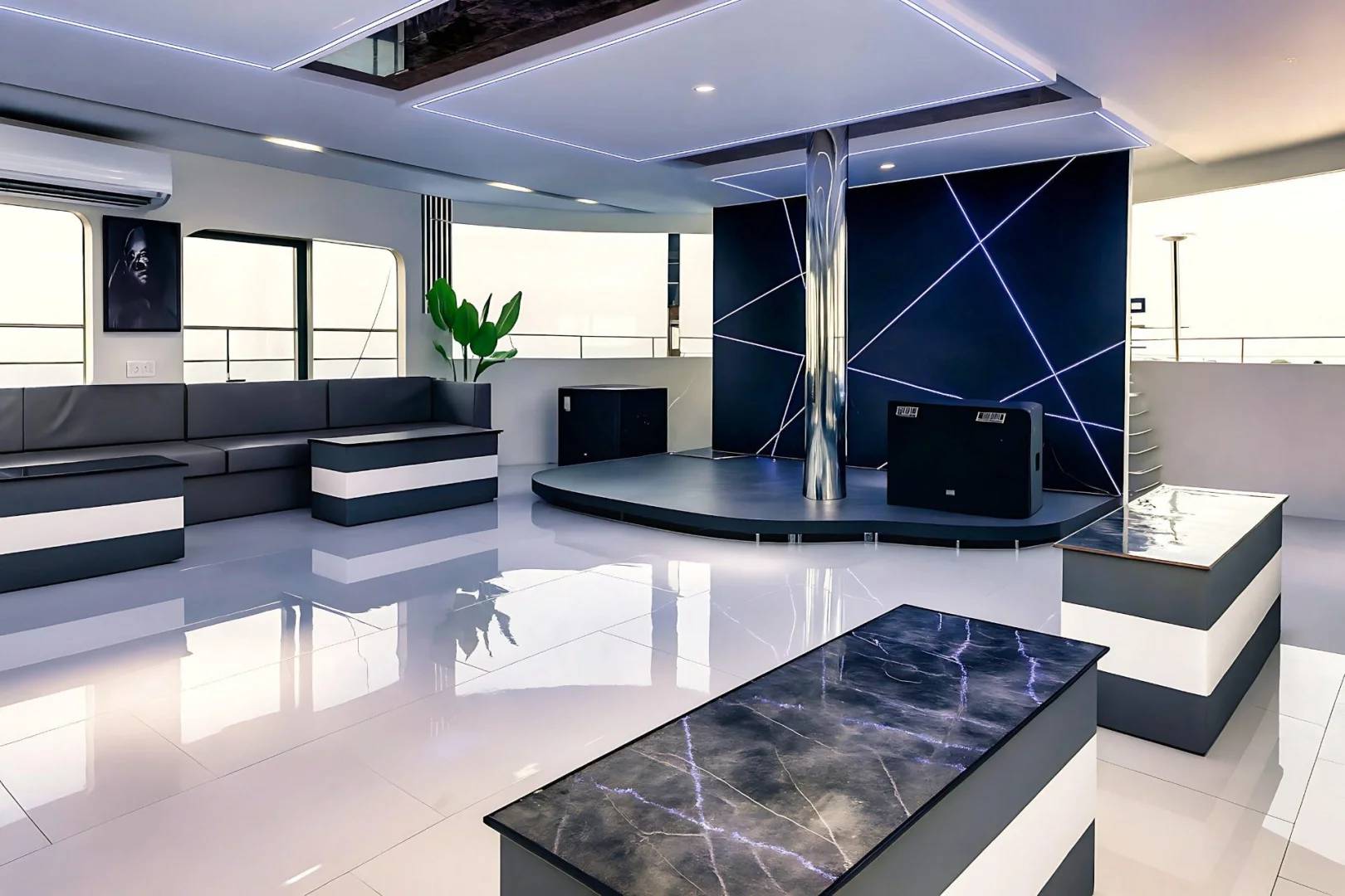 Modern interior with stage and seating at Royal Rave Yacht, Dubai, UAE.