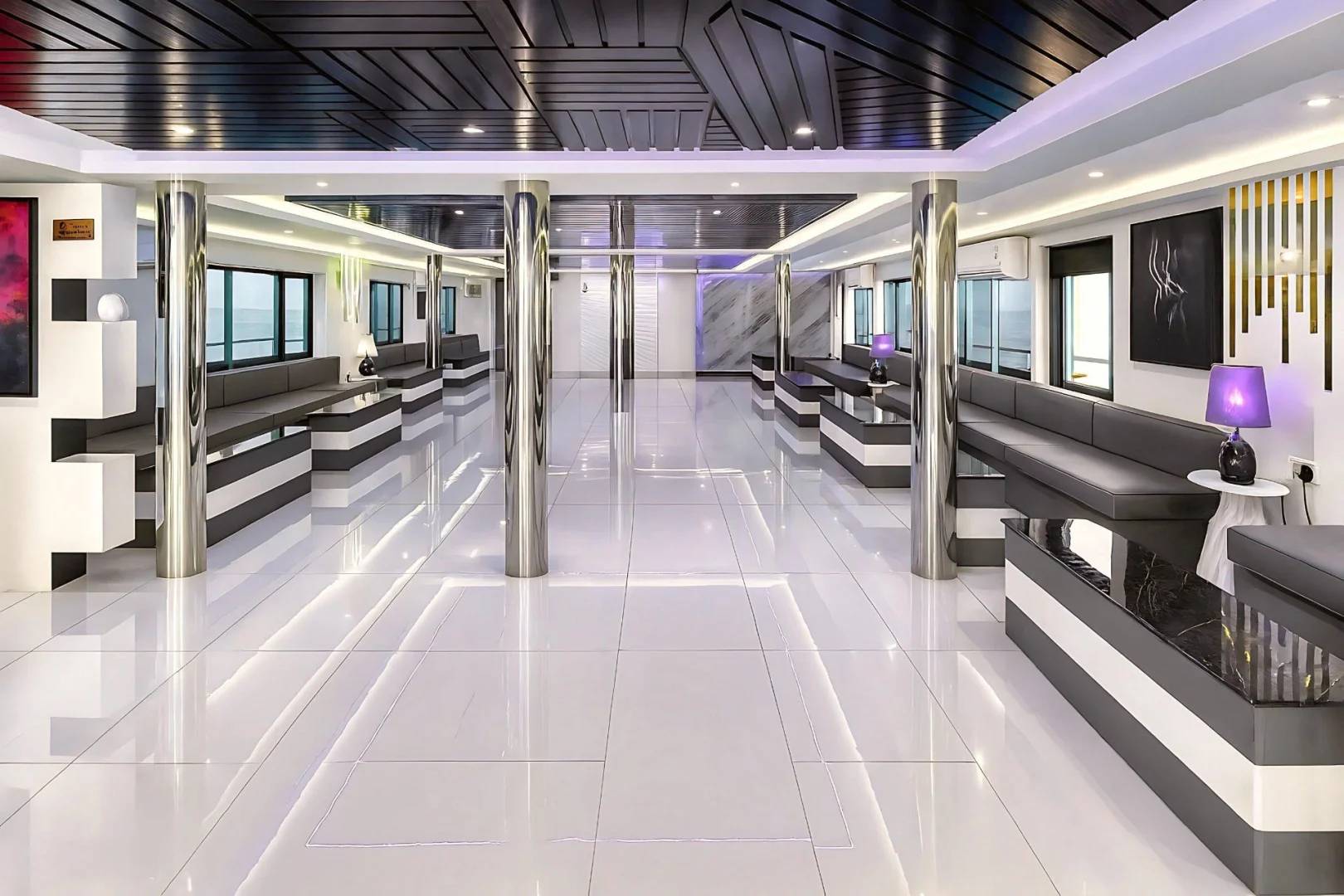 Modern interior with sleek seating at Royal Rave Yacht, Dubai, UAE.
