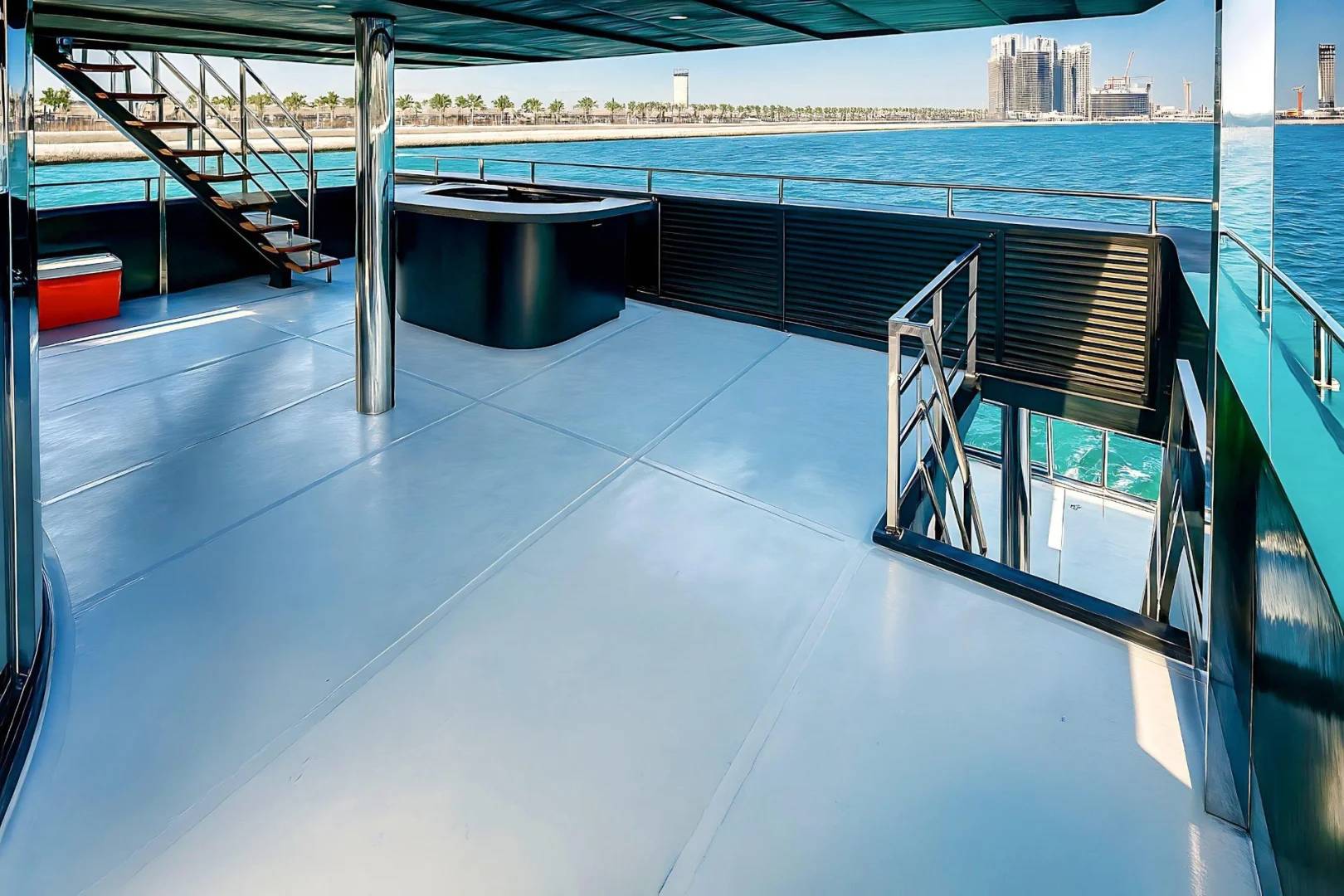 Spacious deck with stairs and railing at Royal Rave Yacht, Dubai, UAE