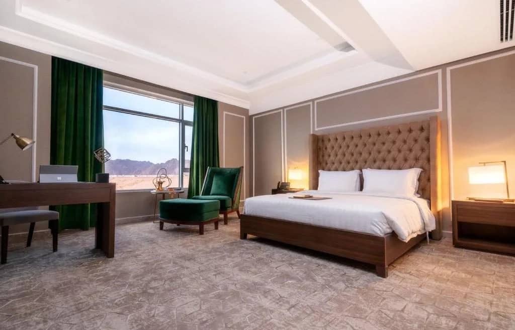 Elegant guest room with mountain view at Sukani Royal Hotel Hail, Saudi Arabia.