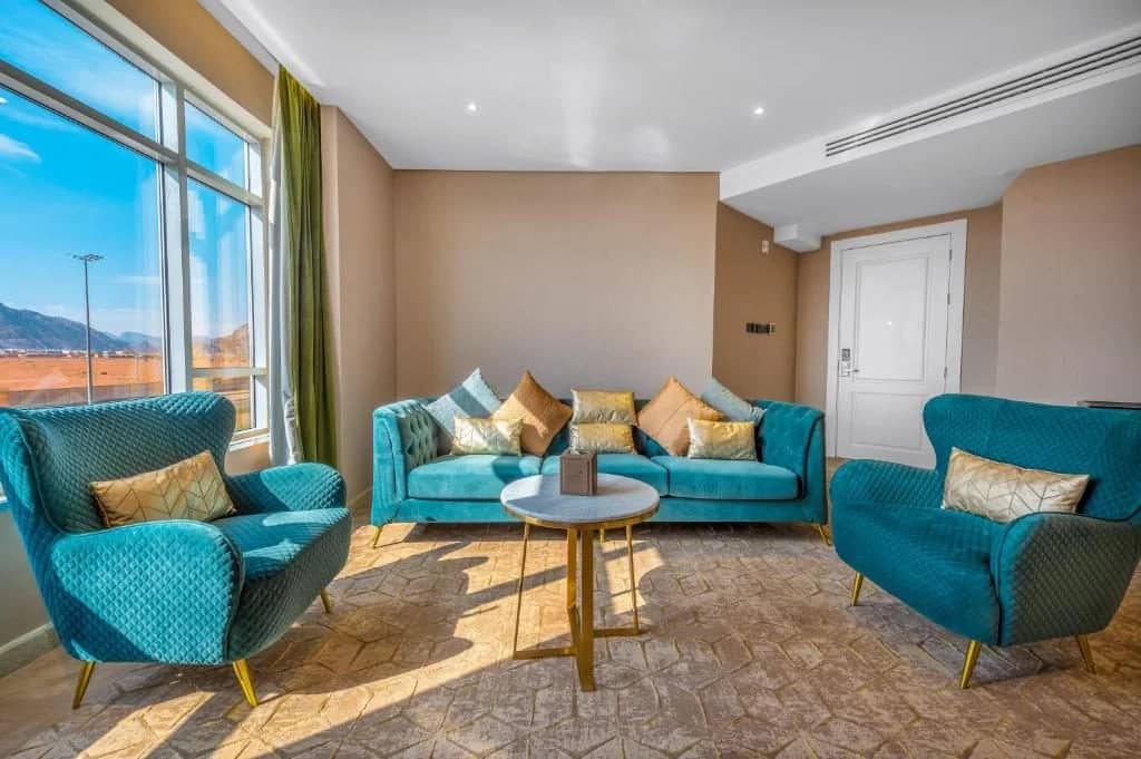 Elegant seating area in guest room at Sukani Royal Hotel Hail, Saudi Arabia